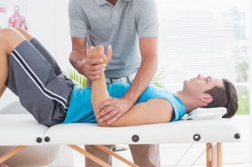 Physical therapist working on a patient